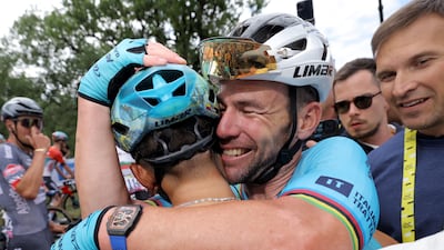 Mark Cavendish celebrates with a Astana Qazaqstan teammate after winning Stage 5 from Saint-Jean-de-Maurienne to Saint Vulbas. EPA