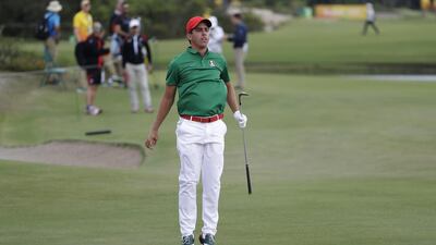 Rodolfo Cazaubon of Mexico leaps in the air to see his shot on the third green during the first round of the men’s golf event at the 2016 Summer Olympics in Rio de Janeiro, Brazil, Thursday, August 11, 2016. Alastair Grant / AP Photo