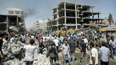 Iain Overton’s book offers a history of suicide bomb attacks, such as this one in Qamishli, Syria, in July 2016 AFP