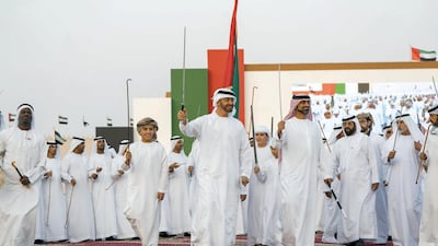 Sheikh Mohammed bin Zayed, Crown Prince of Abu Dhabi and Deputy Supreme Commander of the Armed Forces, attends the Sheikh Zayed Heritage Festival. Seen with Sheikh Ammar bin Humaid, Crown Prince of Ajman, Sheikh Zayed bin Mohammed bin Hamad bin Tahnoon, Sheikh Tahnoon bin Mohammed, Ruler's Representative in Al Ain Region, Sheikh Nahyan bin Mubarak Al Nahyan, UAE Minister of State for Tolerance and Sheikh Khalifa bin Tahnoon bin Mohammed, Director of the Martyrs' Families' Affairs Office of the Abu Dhabi Crown Prince Court. Rashed Al Mansoori / Crown Prince Court - Abu Dhabi