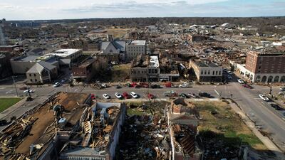 The tornadoes killed between 75 and 100 people in Kentucky, with reports of more deaths in Arkansas. Reuters