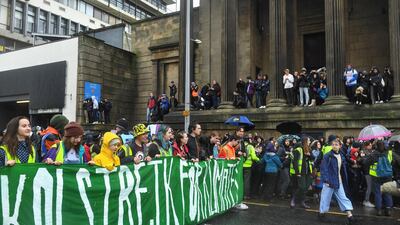 Activists carried placards and shouted slogans. Reuters