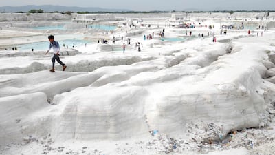 A sprawling expanse of white marble waste in Rajasthan's Kishangarh city, India, is drawing visitors to a landscape that resembles a snow-covered valley more than a dumping ground. AFP