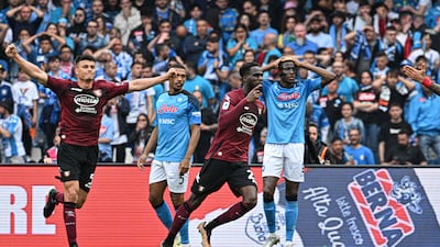 Salernitana's Boulaye Dia, centre, celebrates after scoring the equaliser to deny Napoli the Serie A title on April 30, 2023. AFP