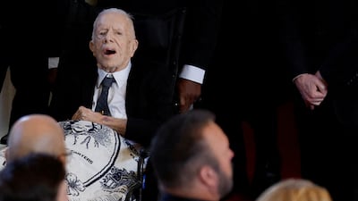 Former US president Jimmy Carter attends the service for his wife. Reuters