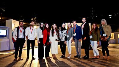 Some of the young artists who are exhibiting their work at City Walk Jumeirah in Dubai. Courtesy YAA
