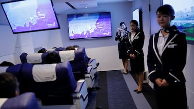 Staff dressed as flight attendants, greet guests at the 'First Airlines.