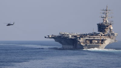 The US Navy's aircraft carrier USS Dwight D. Eisenhower transits the Strait of Hormuz last year. AFP