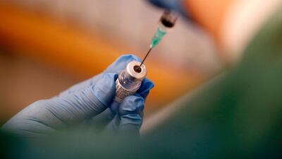 A nurse prepares to administer Pfizer-BioNTech COVID-19 vaccine at the hospital, in Ventspils, Latvia, December 28, 2020. EPA