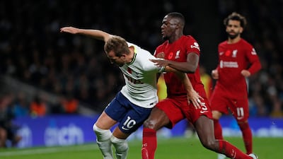 Tottenham's Harry Kane under pressure from Liverpool defender Ibrahima Konate. AFP