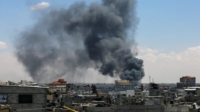 Smoke rises after an Israeli strike on Tuesday, as forces launch a ground and air operation in eastern Rafah. Reuters