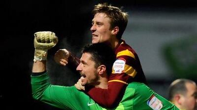 Goalkeeper Matt Duke was the penalty shootout hero for Bradford against Arsenal. Laurence Griffiths / Getty Images