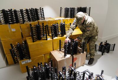 A Ukrainian soldier handles FPV (First-Person View) drones in the city of Lviv in western Ukraine. EPA