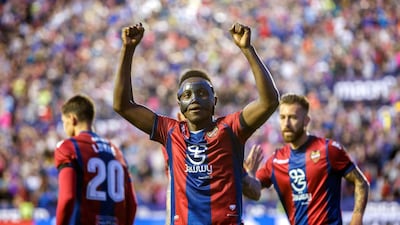 Levante's Ghanaian striker Emmanuel Boateng celebrates after scoring the second of his three goals against Barcelona at Ciudad de Valencia Stadium in Valencia. Biel Alino / EPA