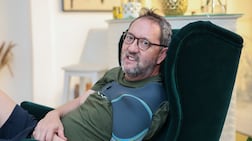 Carl Davies, pictured in 2024 after he had a stroke, has written a book on his rehabilitation. Victor Besa / The National
