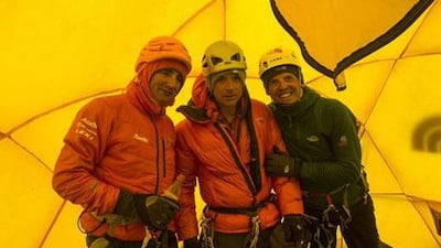 Climbers Ueli Steck of Switzerland, (left), and Simone Moro of Italy, (right), accompanied by British alpine photographer Jonathan Griffith in a tent at the 6,500-metre Camp Two on Mount Everest, immediately after an altercation with Nepalese Sherpas.