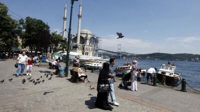 5th: Istanbul. Tourists walk in front of the Ottoman era Ortakoy Mecidiye Mosque and Bosphorus Bridge in Istanbul. Istanbul is Europe’s most diversified destination, with 50 per cent of its international overnight visitors coming from 33 feeder cities. Osman Orsal / Reuters