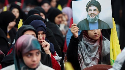 A supporter of Hezbollah at a rally commemorating the group's leaders, in Beirut's suburbs, on February 16. Reuters
