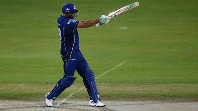 Andrew Symonds of Capricorn Commanders bats during his 62-run innings against Libra Legends on Friday night in the Masters Champions League. Francois Nel / Getty Images