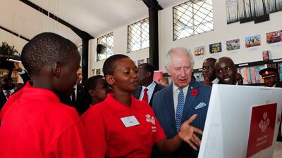 King Charles meets secondary school pupils at Eastlands Library in Nairobi. Reuters