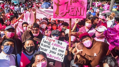 Supporters of Philippine Vice President and presidential candidate Leni Robredo attend a campaign rally in Makati, in suburb Manila. AFP