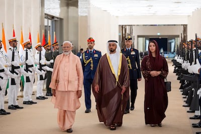 Sheikh Saif bin Zayed, UAE Deputy Prime Minister and Minister of Interior and Reem Al Hashimi, UAE Minister of State for International Cooperation with Narendra Modi at the Presidential Airport. Ryan Carter / UAE Presidential Court