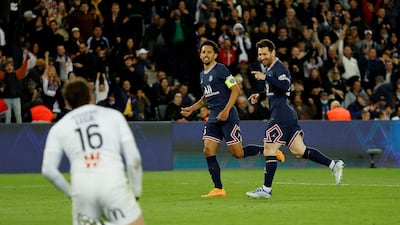 Lionel Messi celebrates with Marquinhos after scoring for Paris Saint-Germain against Lens in their Ligue 1 match at the Parc des Princes on Saturday, April 23, 2022. Reuters