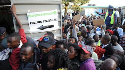 Multiple attacks against security forces in Kenya killed at least 12 people today as Kenyans waited in long lines to cast ballots five years after more than 1,000 people died in election-related violence. Jennifer Huxta / AFP Photo