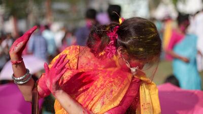 Indian students throw paint over each in Kolkata. EPA