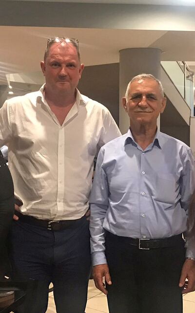 From left, Barry Manners with Shammon Roel, resident engineer of the Dukan Dam where he was held hostage. PA