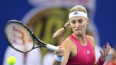 Kristina Mladenovic of the UAE Royals returns a volley to Micromax Indian Aces player Ana Ivanovic during their match of the International Premier Tennis League (IPTL) at Hamdan bin Mohammed bin Rashid Sports Complex in Dubai. Ali Haider / EPA