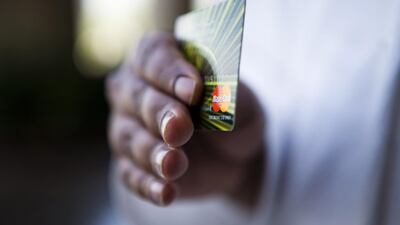 Banks want to put debit cards in shoppers’ hands. Andrew Henderson / The National