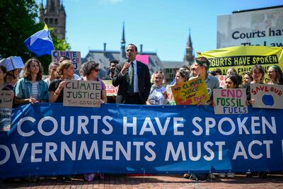 Vanuatu's Climate Change Minister Ralph Regenvanu delivers a speech at a demonstration at The Hague. AFP
