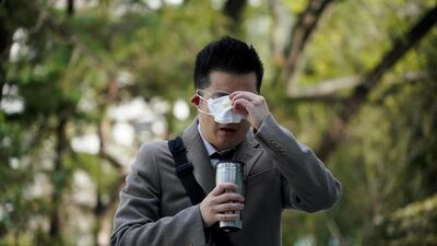 Park Hyun, a professor of Pusan National University Park Hyun who used to be a coronavirus patient, drinks a warm water upon his arrival to Pusan National University in Busan, South Korea, March 30, 2020. REUTERS/Kim Hong-Ji