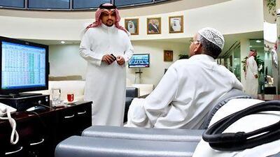 Traders at a bank in Riyadh. Money managers say an easing of tight investment laws will give a boost to liquidity in the Arab world's largest economy and the wider region. Hassan Ammar / AFP