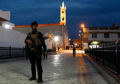 An Iraqi army soldier stands patrol outside the Immaculate Conception Church during preparations for Pope Francis' trip to Iraq in Qaraqosh. AP Photo