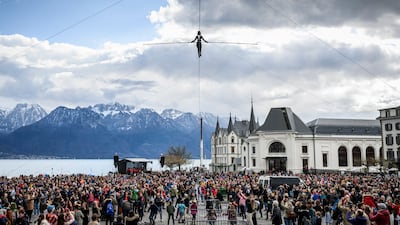 Tightrope walker Tatiana-Mosio Bongonga crosses the market square in the Swiss town of Vevey on a 180-metre cable during the Ligne Ouverte show. AP