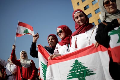Women during anti-government protests in Beirut. REUTERS