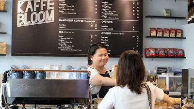 Kaffe Bloom sits at the back of 1004 Gourmet and sells coffee as well as small bites to eat. Chris Whiteoak / The National