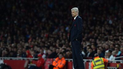 Arsenal manager Arsene Wenger paces the touchline on Monday night during his side's draw with Liverpool at the Emirates Stadium. Ben Stansall / AFP / August 24, 2015