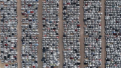 An image taken by a drone shows new cars parked at Tilbury Docks in Britain. US President Donald Trump announced new import taxes of 25 per cent on cars and car parts coming into the US. The tariffs will take effect on April 2, and charges on businesses importing vehicles will begin the following day. EPA
