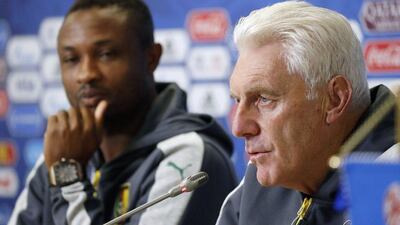 Cameroon manager Hugo Broos and midfielder Sebastien Siani. EPA