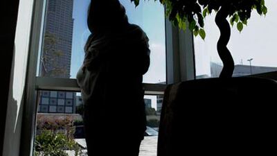 Complications arose when Sawsan Ibrahim had a gastric band procedure done by a private hospital in Sharjah. It took her five years and multiple surgeries to repair the damage done. Razan Alzayani / The National