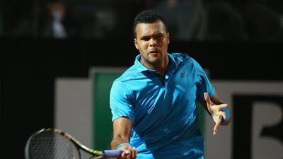 Jo-Wilfried Tsonga in action against Alexandr Dolgopolov the first round of the Rome Masters on Monday. Julian Finney / Getty Images / May 12, 2014
