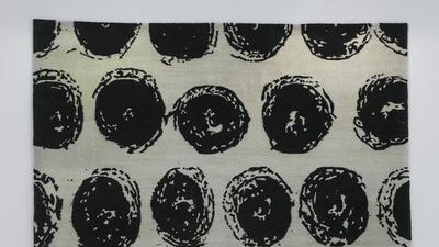 It is a collection consciously designed to challenge preconceived ideas about what the Afghan carpet is – and could be. The pieces are striking in their lack of colour – they are predominantly black and white – and in their bold, contemporary motifs. They look about as different from a traditional Afghan carpet as can be, which, Norma Kamali explains, was the whole point.