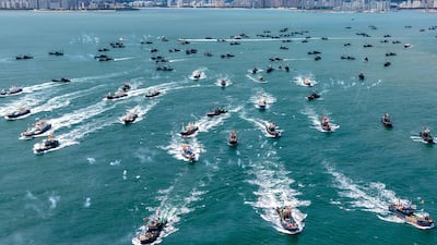 Boats head out to sea from Jimiya Fishing Port in Qingdao, China, as the autumn fishing season gets under way after a four-month summer moratorium. AFP