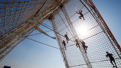 Organisers say Tough Mudder is designed to drag you out of your comfort zone by testing your physical strength and mental grit. Reuters