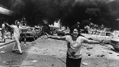 A woman cries in shock, minutes after a car bomb exploded in a crowded neighbourhood of mainly-Muslim west Beirut on August 8, 1986, killing 13 people, including three children, and wounding at least 92. AFP