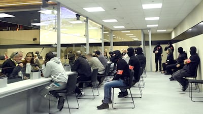 Lawyers with clients sitting in the box for the accused, at the start of the trial at a Brussels court. AFP