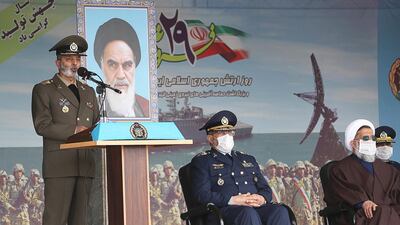 Iranian Army Commander-in-chief Abdolrahim Mousavi addresses a military parade. Iranian Army/ EPA / HO
